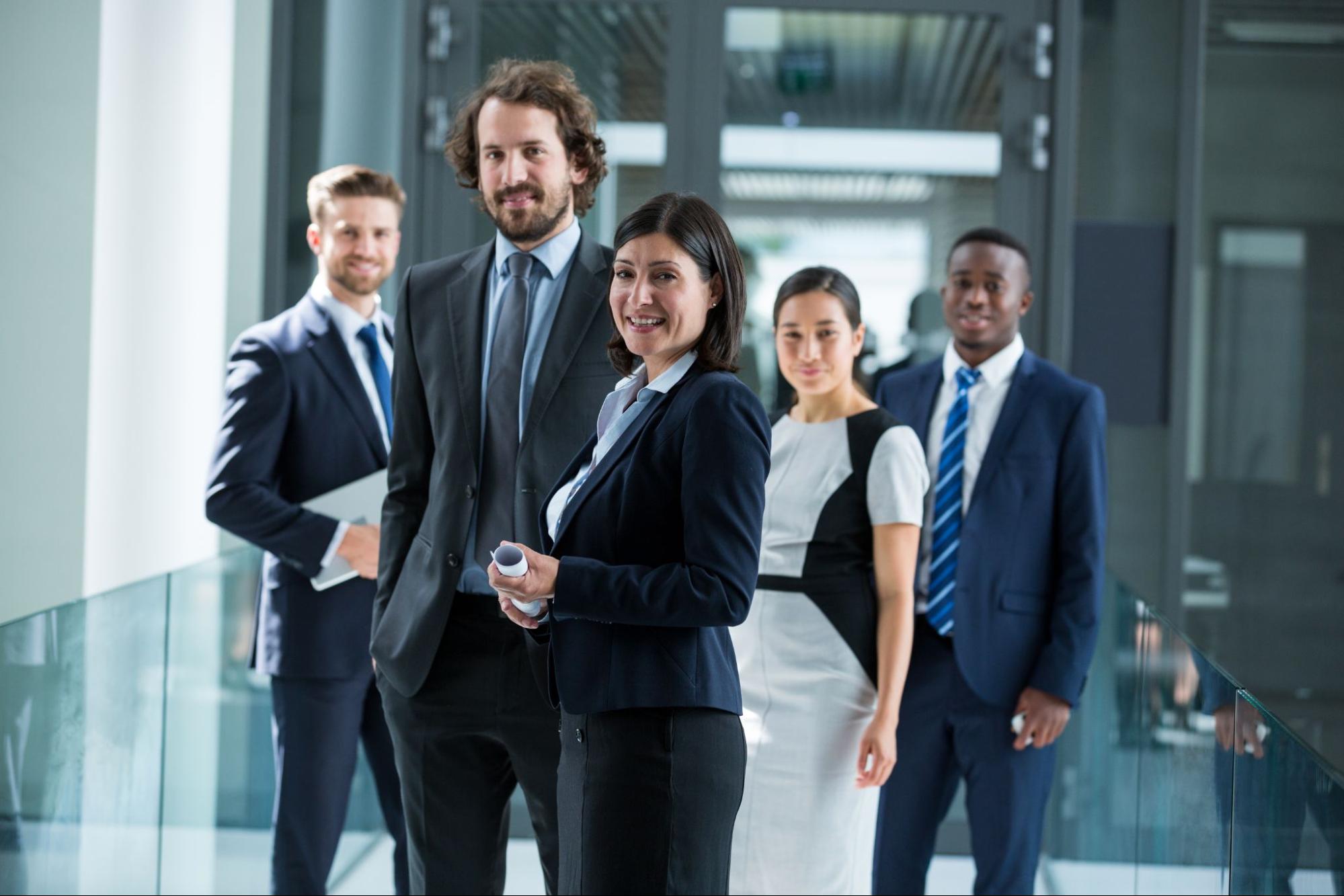 A photograph of smiling business advisors.